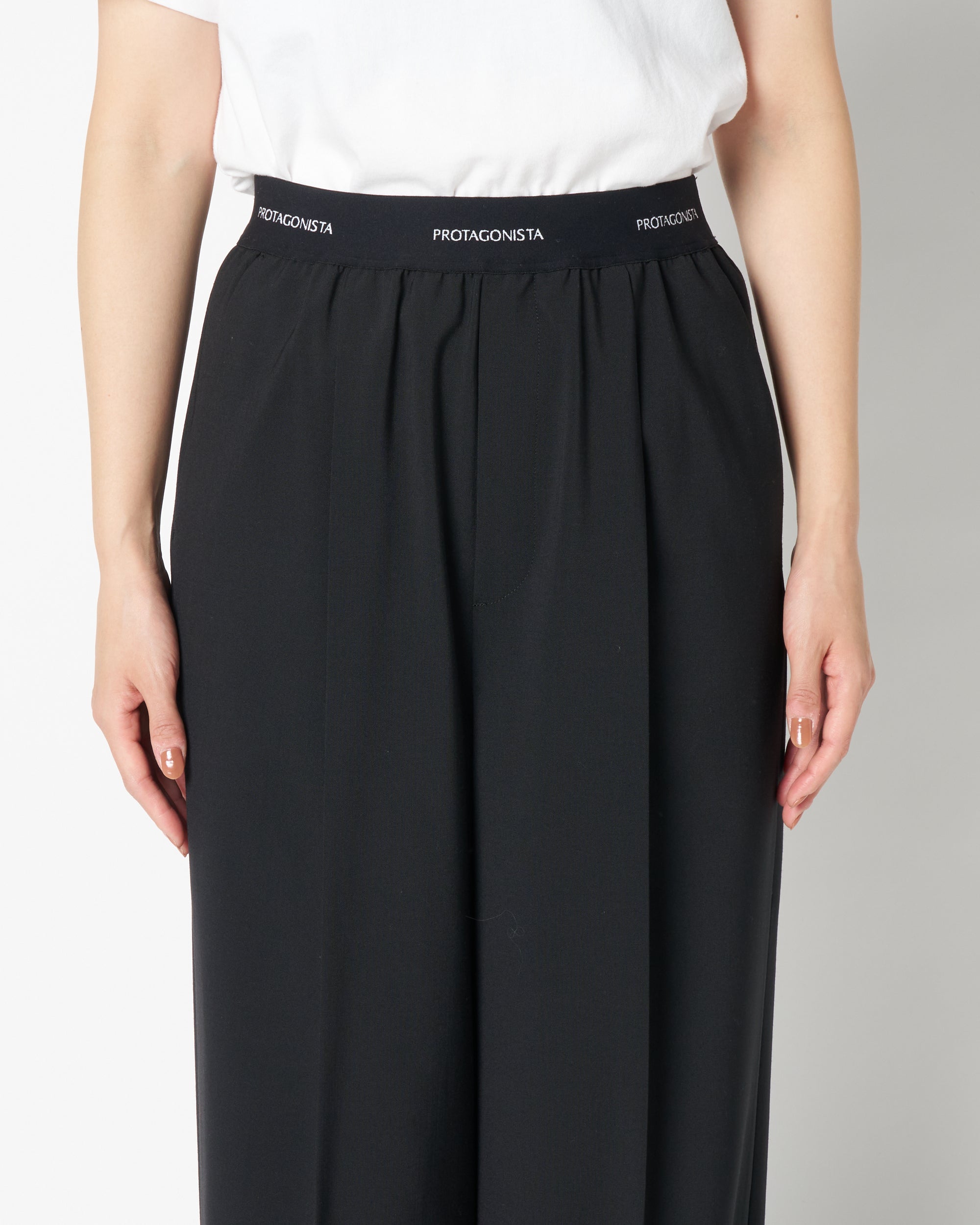 Waist logo slacks pants